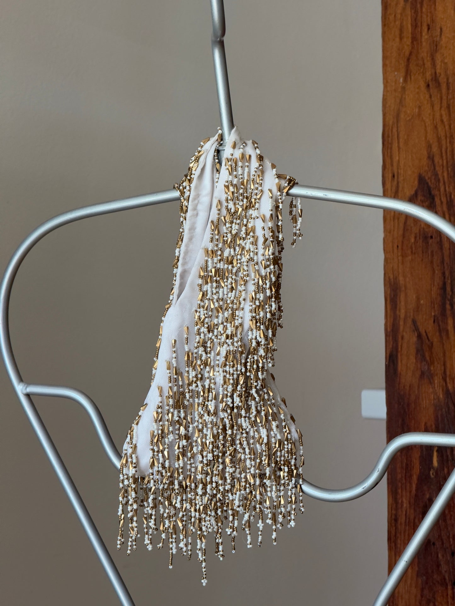 Vintage Y2K Ivory Teardrop Wristlet with Gold Fringe Beading