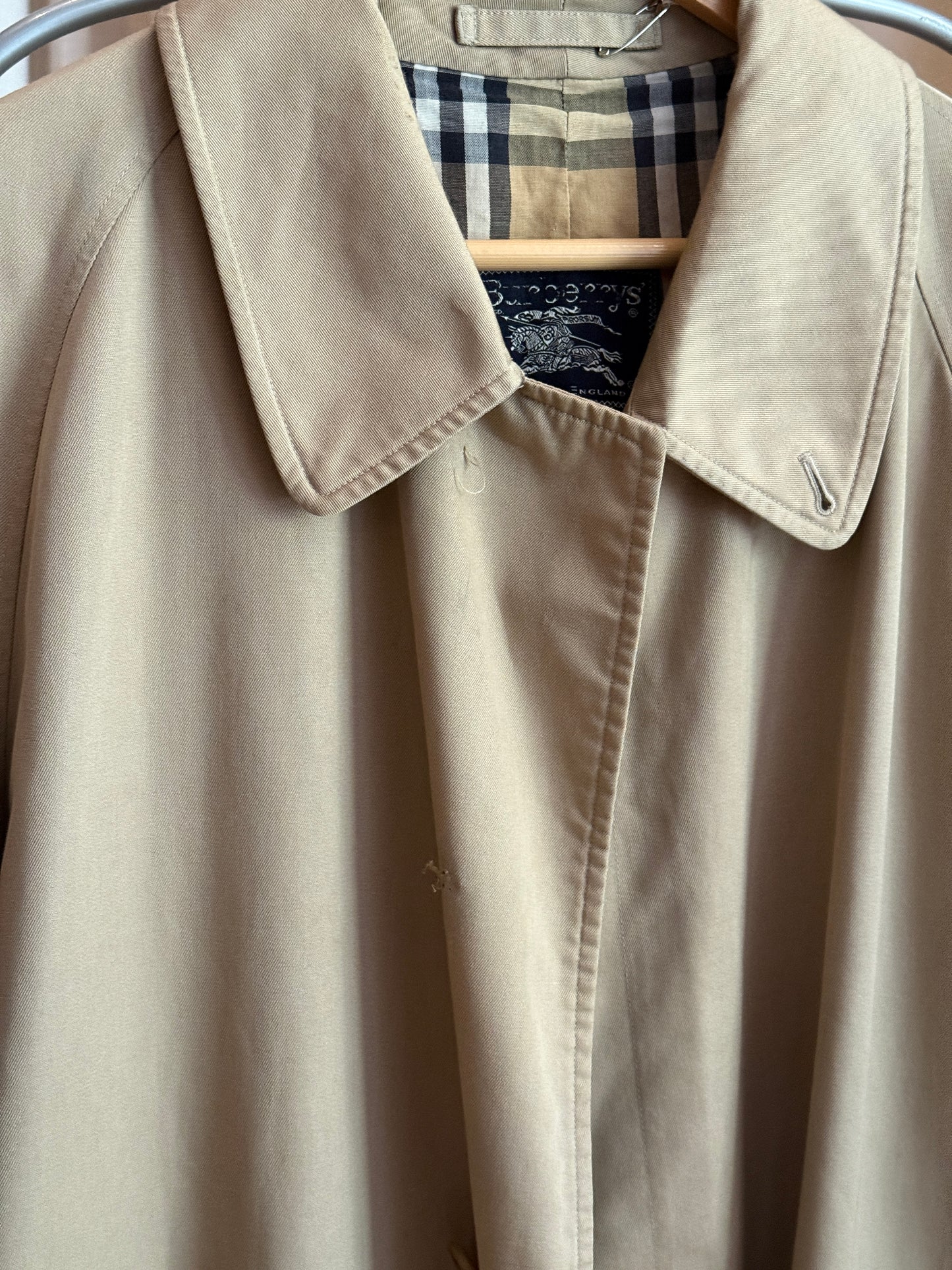 Vintage single breasted Burberry's trench coat with check lining